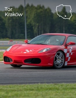 Czerwone Ferrari, w tle inne super samochody